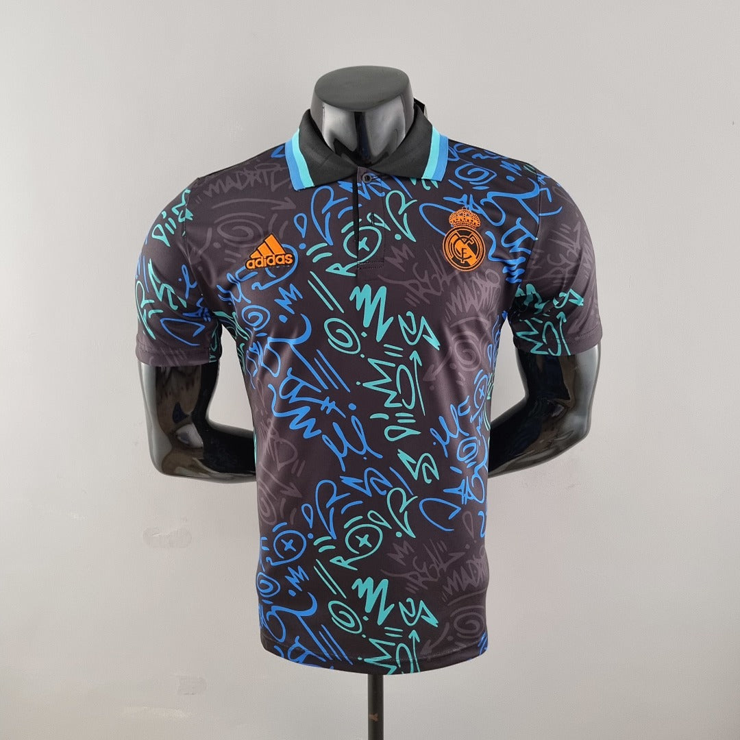 Polo 21/22 Real Madrid Noir Graffiti