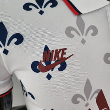 Polo 22/23 PSG Co branded version Blanc